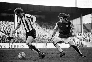 Images Dated 30th January 1975: F. A. Cup. Coventry City v. Arsenal. Alan Ball, taking advantage of a terrible mix-up in