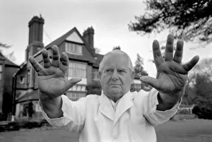 Images Dated 24th January 1975: Faith Healer Mr. Harry Edwards shows of his hands. January 1975 75-00325