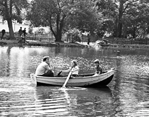 A family enjoying a boat ride on the lake in Albert Park, Middlesbrough, North Yorkshire A family enjoying a boat ride on the lake in Albert Park, Middlesbrough, North Yorkshire