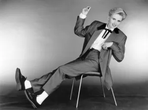 Fashion - Suits: Teddy boy. The fifties style. Female model wears man' Fashion - Suits: Teddy boy. The fifties style. Female model wears man'