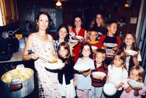 Feeding time in the Harvey household. Mother, Marie Harvey, pictured with her 13 children Feeding time in the Harvey household. Mother, Marie Harvey, pictured with her 13 children