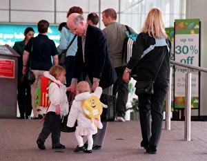 Fergus McCann and family at Glasgow Airport April 1999 taking hold of his Fergus McCann and family at Glasgow Airport April 1999 taking hold of his