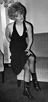 Film actress Linda Thorson wearing a glamourous black dress Film actress Linda Thorson wearing a glamourous black dress
