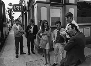 Film Bedazzled 1967 Raquel Welch Dudley Moore and Peter Cook standing outside pub Film Bedazzled 1967 Raquel Welch Dudley Moore and Peter Cook standing outside pub