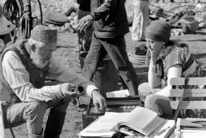 Film Director John Huston on the set of his latest picture " Film Director John Huston on the set of his latest picture "