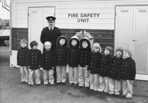 Fire safety unit Sub officer Graham Shiel with children at Southridge First Shcook Fire safety unit Sub officer Graham Shiel with children at Southridge First Shcook