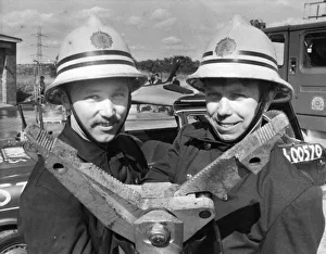 Firefighters Chris Foster and John Burke show off the new vehicle cutting equipment at Firefighters Chris Foster and John Burke show off the new vehicle cutting equipment at