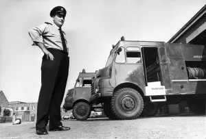 Fireman Jim Cairns with two of the fire appliances brought out of storage to help fight Fireman Jim Cairns with two of the fire appliances brought out of storage to help fight