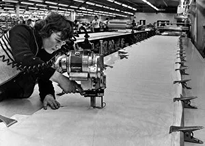 Images Dated 14th February 1978: First stage of cutting out - 240 layers of 30 metre long fabric at Dewhirst Factory