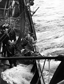 Fishing trawler out at sea in heavy weather Fishing trawler out at sea in heavy weather