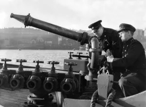 Some of the floating firemen demonstrating the boat's water gun Some of the floating firemen demonstrating the boat's water gun