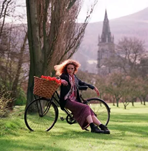 Flower power fashion feature 1998 girl in gardens country side bike basket trees Flower power fashion feature 1998 girl in gardens country side bike basket trees