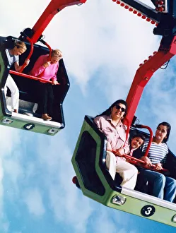 Flying through the air with the greatest of ease on one of the rides at the Clairville Flying through the air with the greatest of ease on one of the rides at the Clairville
