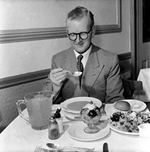 Food: Vegetarian: Mr. John Walton, eating the birthday lunch in the vegetarian restaurant Food: Vegetarian: Mr. John Walton, eating the birthday lunch in the vegetarian restaurant