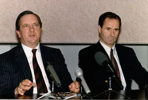 Football Chairman of Arsenal FC Peter Hill Wood sitting in a press conference alongside Football Chairman of Arsenal FC Peter Hill Wood sitting in a press conference alongside