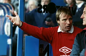Football manager of Sheffield United Dave Bassett talks with his coach in the dug out Football manager of Sheffield United Dave Bassett talks with his coach in the dug out