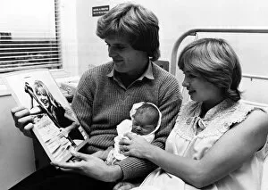 Images Dated 12th December 1979: Footballer Gordon McQueen with his wife Yvonne and their new born daughter Hayley McQueen