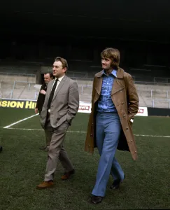 Footballer Rodney Marsh walks around Maine Road with Manchester City chairman Eric Footballer Rodney Marsh walks around Maine Road with Manchester City chairman Eric