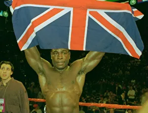 Frank Bruno holds up the union jack after his third round defeat at the hands of Mike Frank Bruno holds up the union jack after his third round defeat at the hands of Mike
