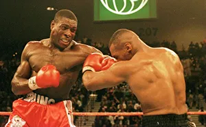 Frank Bruno lands a rare punch on Mike Tysons chin during the WBC world title fight in Frank Bruno lands a rare punch on Mike Tysons chin during the WBC world title fight in