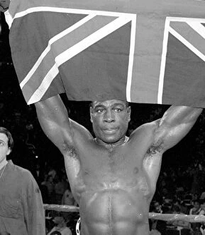 Images Dated 17th March 1996: Frank Bruno leaves the ring after his third round defeat defeat by Mike Tyson