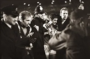 Frank McLintock helped off the pitch April 1970 holding InterCities Fairs Cup Frank McLintock helped off the pitch April 1970 holding InterCities Fairs Cup