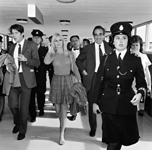 French actress Brigitte Bardot arrives at London airport as she visits England to film French actress Brigitte Bardot arrives at London airport as she visits England to film