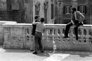 Friends greet each other in a street in the city of Rome, Italy April 1975 Friends greet each other in a street in the city of Rome, Italy April 1975