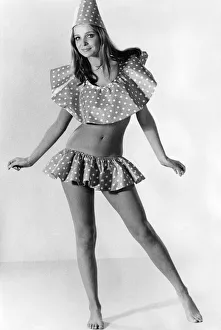 Two frills make Penny Yates's bikini cover-up. The idea has gone to her head too Two frills make Penny Yates's bikini cover-up. The idea has gone to her head too