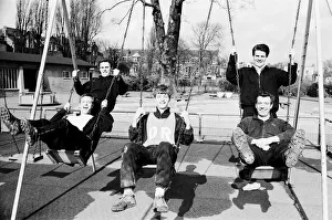 Fulham players on the swings after training was abandoned in London before their FA Cup Fulham players on the swings after training was abandoned in London before their FA Cup