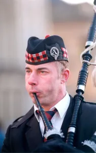 Fulton McInnes playing the bagpipes on Grey Street, Newcastle Fulton McInnes playing the bagpipes on Grey Street, Newcastle