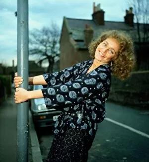 Images Dated 1st March 1983: Gail Harrison holding onto lamp-post March 1983