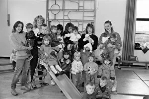 Images Dated 12th October 1990: Games time... Members of Golcar St Johns mothers and toddlers group have given 100