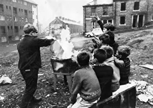 A gang of children risks injury playing with fire on wasteland at Beaumont Street A gang of children risks injury playing with fire on wasteland at Beaumont Street