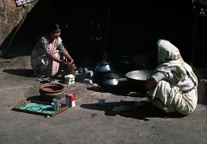 Garo women preparing meal at Garo village in Keoachola North of Dacca Bangladesh Garo women preparing meal at Garo village in Keoachola North of Dacca Bangladesh
