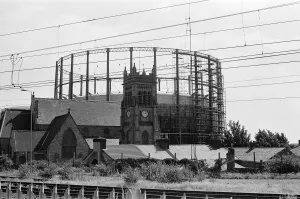 Garston Gasometer, dwarfs church in foreground, Liverpool, Merseyside, 16th August 1988 Garston Gasometer, dwarfs church in foreground, Liverpool, Merseyside, 16th August 1988