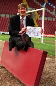 Gary Mackay Hearts footballer holding For Sale sign Gary Mackay Hearts footballer holding For Sale sign