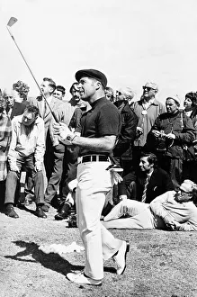 Gary Player and spectators follow his shot during practice for the British Golf Open Gary Player and spectators follow his shot during practice for the British Golf Open