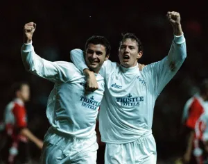 Gary Speed of Leeds celebrates with team mate after scoring goal during UEFA Cup match Gary Speed of Leeds celebrates with team mate after scoring goal during UEFA Cup match