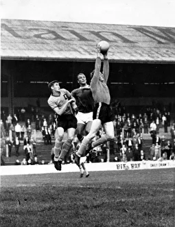 gather the ball under pressure from Cardiff's John Charles gather the ball under pressure from Cardiff's John Charles