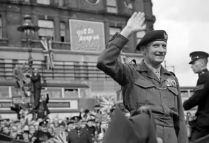 General Bernard Montgomery waves to the crowd on his way to Lambeth after World War Two General Bernard Montgomery waves to the crowd on his way to Lambeth after World War Two