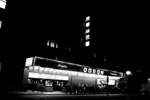 General pictures of Newcastle City Centre at night 8 December 1970 - People queue for General pictures of Newcastle City Centre at night 8 December 1970 - People queue for