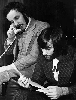 Images Dated 15th January 1971: George Best and his business partner Malcolm Mooney working at Bests home