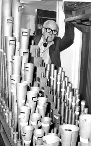 George Blake of the Cleveland Organ Society with the trumpet pipes of the Wurlitzer organ George Blake of the Cleveland Organ Society with the trumpet pipes of the Wurlitzer organ