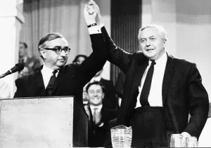 George Brown MP with Harold Wilson arms raised in air following Brown' George Brown MP with Harold Wilson arms raised in air following Brown'