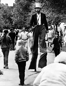 A giant clown, on stilts, at the Tyneside Summer Exhibition. 28th July 1987 A giant clown, on stilts, at the Tyneside Summer Exhibition. 28th July 1987