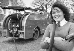 Gillian Baxter with the fire engine which ready for action should it be need ied in this Gillian Baxter with the fire engine which ready for action should it be need ied in this