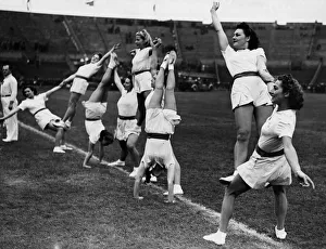 Girls of the National Fire Service (NFS) undergo physical training during a PT display at Girls of the National Fire Service (NFS) undergo physical training during a PT display at