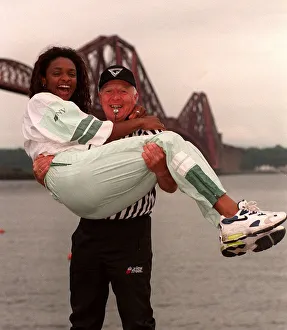 Gladiators referee John Anderson gives a lift to Gladiator Rocket (Pauline Richards Gladiators referee John Anderson gives a lift to Gladiator Rocket (Pauline Richards