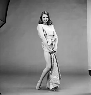 Glamour girl Geraldine June wearing a pinafore. January 1975 75-00316-013 Glamour girl Geraldine June wearing a pinafore. January 1975 75-00316-013